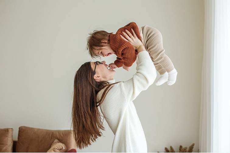 Woman holding child